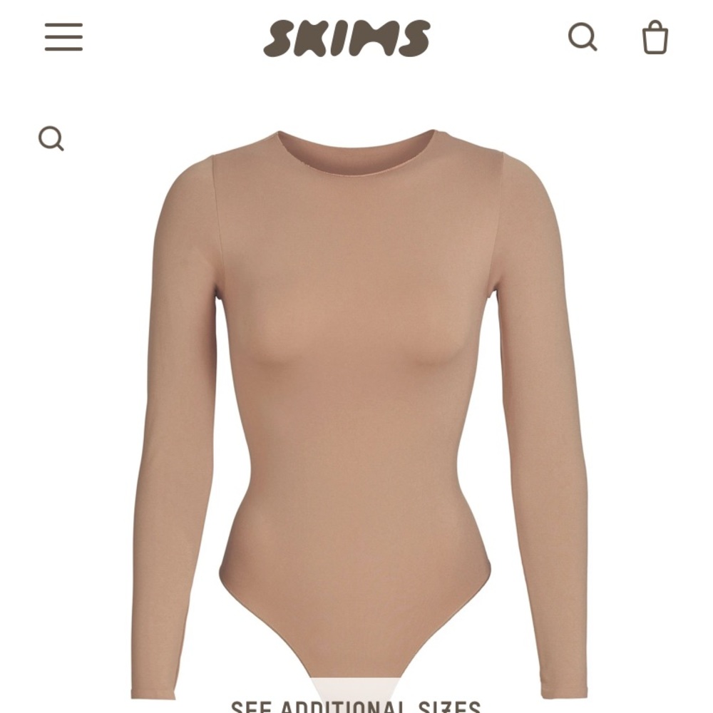 SKIMS essential body suit. In box NEVER WORN